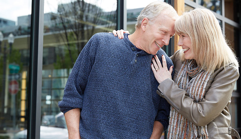 Happy couple with restored gums